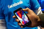 A phone running the Facebook Home program during an event at the company's headquarters in Menlo Park, Calif. on April 4