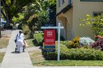 A "For Sale" sign outside a house in Albany, California.