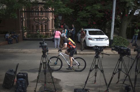 Journalists outside the home of Pistorius' uncle in Pretoria