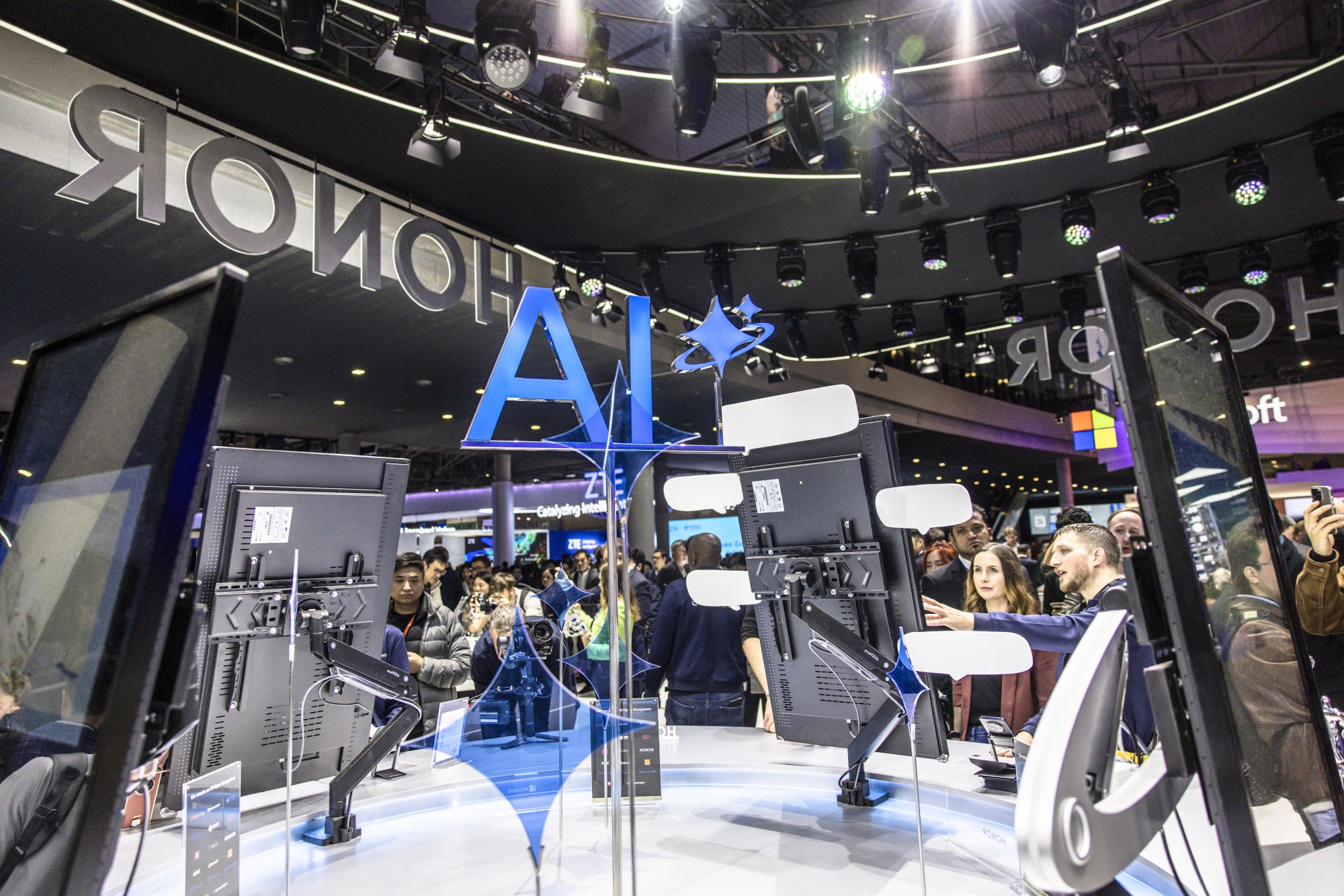An artificial intelligence (AI) logo at the Honor Device Co. pavilion at the MWC25 tech show in Barcelona, Spain, on Monday, March 3, 2024. The Mobile World Congress tech show runs March 3-6.