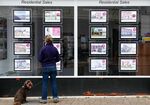 Residential sales displayed in the window of an estate agent in Loughborough, UK.