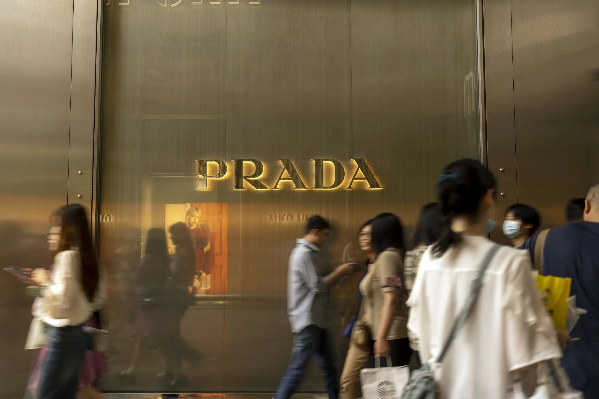 Prada Rides Luxury Boom While Mass Retailers Struggle as Chinese Demand Flags Bloomberg