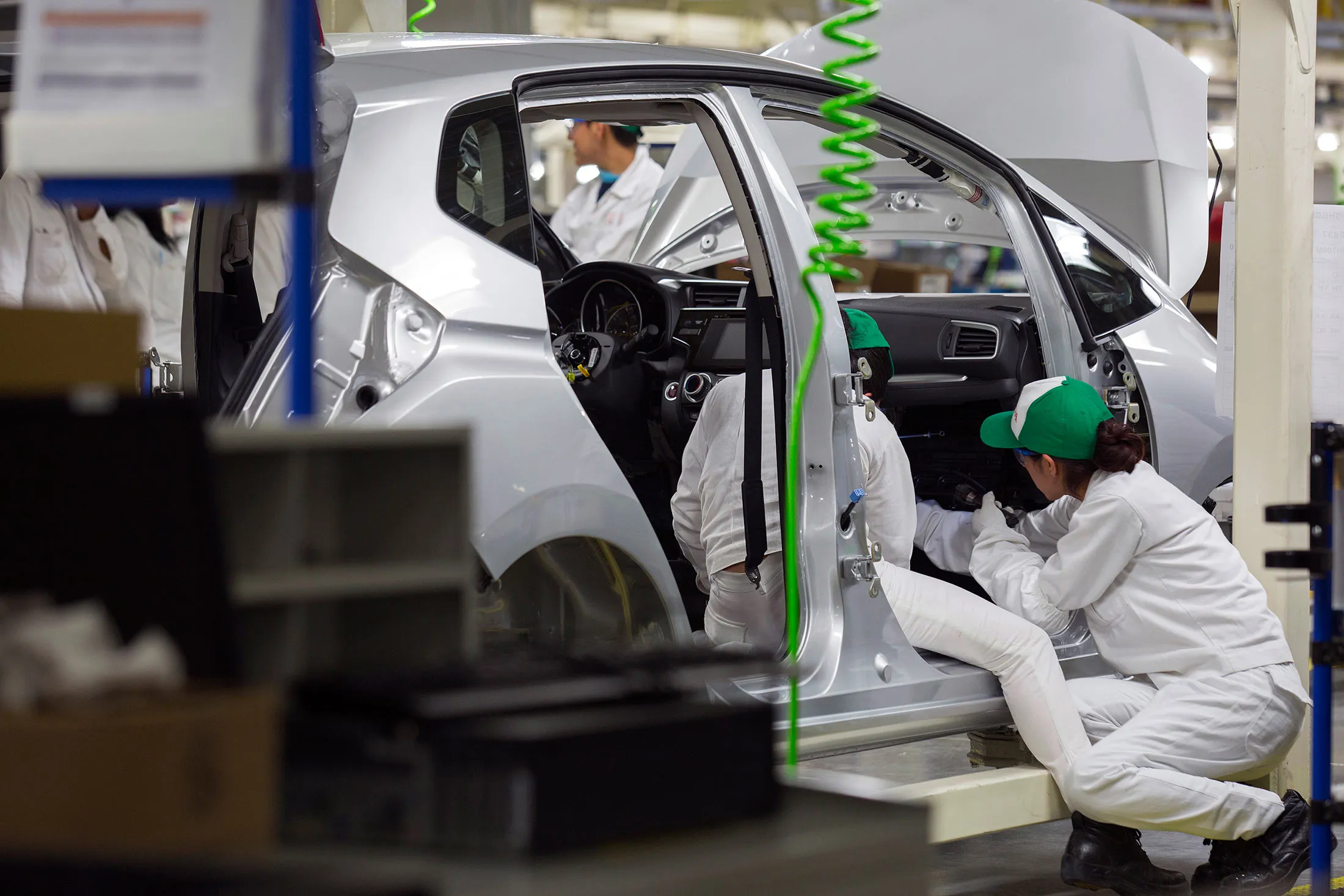 Workers on the production line at Honda Motor’s plant in Celaya, Mexico, on Feb. 21, 2014.
