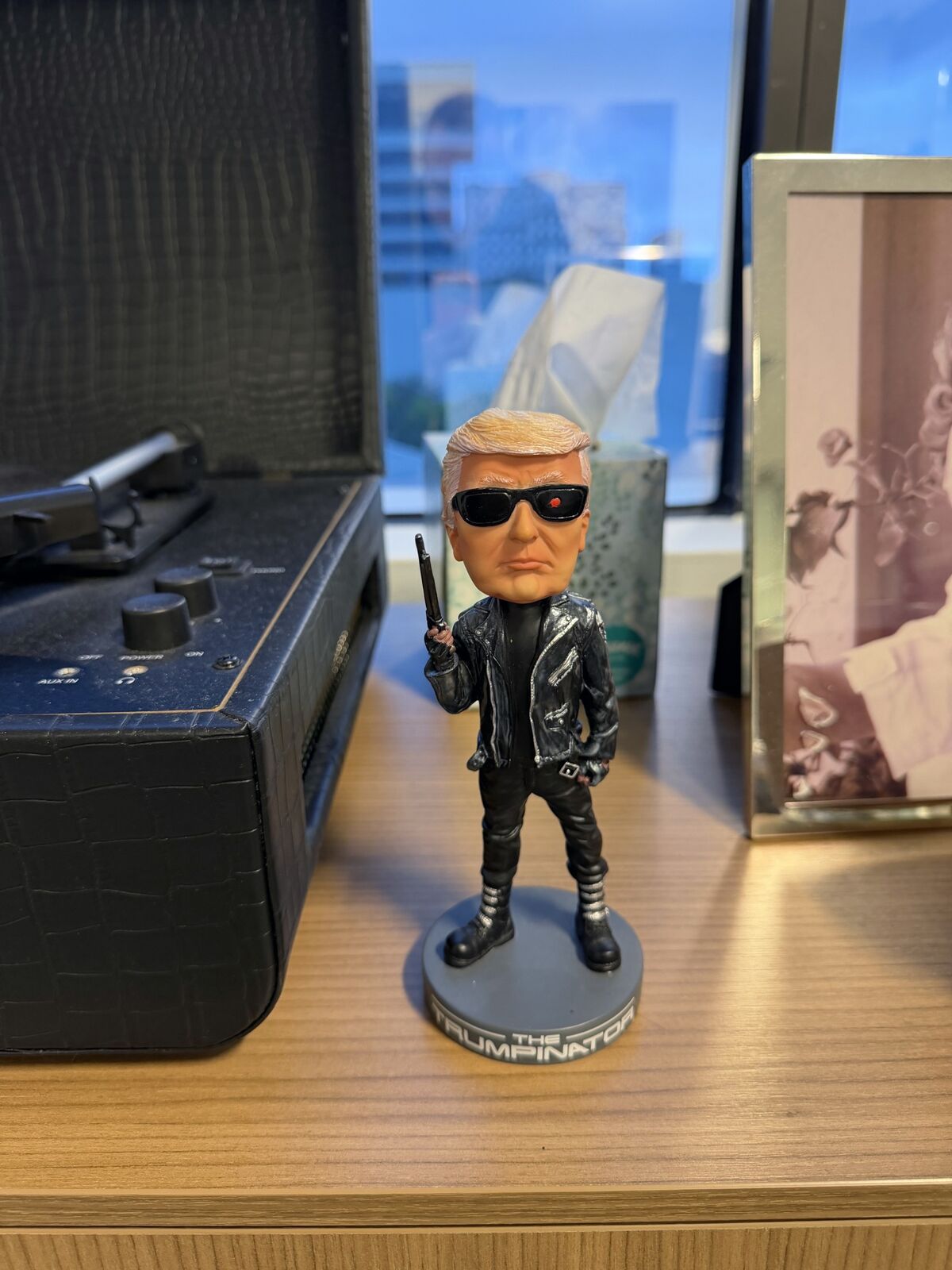 The Lawyer Suing Media Outlets for Trump Has a ‘Trumpinator’ Doll Behind His Desk