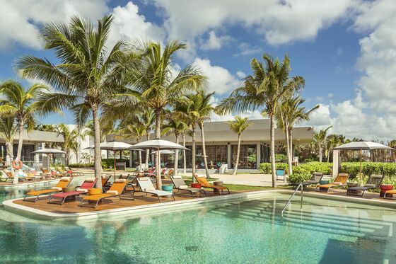 This Bizarre Sunscreen Booth Is Driving Cocktail Sales at Hotel Pools