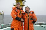 Neil Duffin (left), president of Exxon Mobil Development, and Igor Sechin, president of Rosneft, on an offshore drilling platform in July 2013