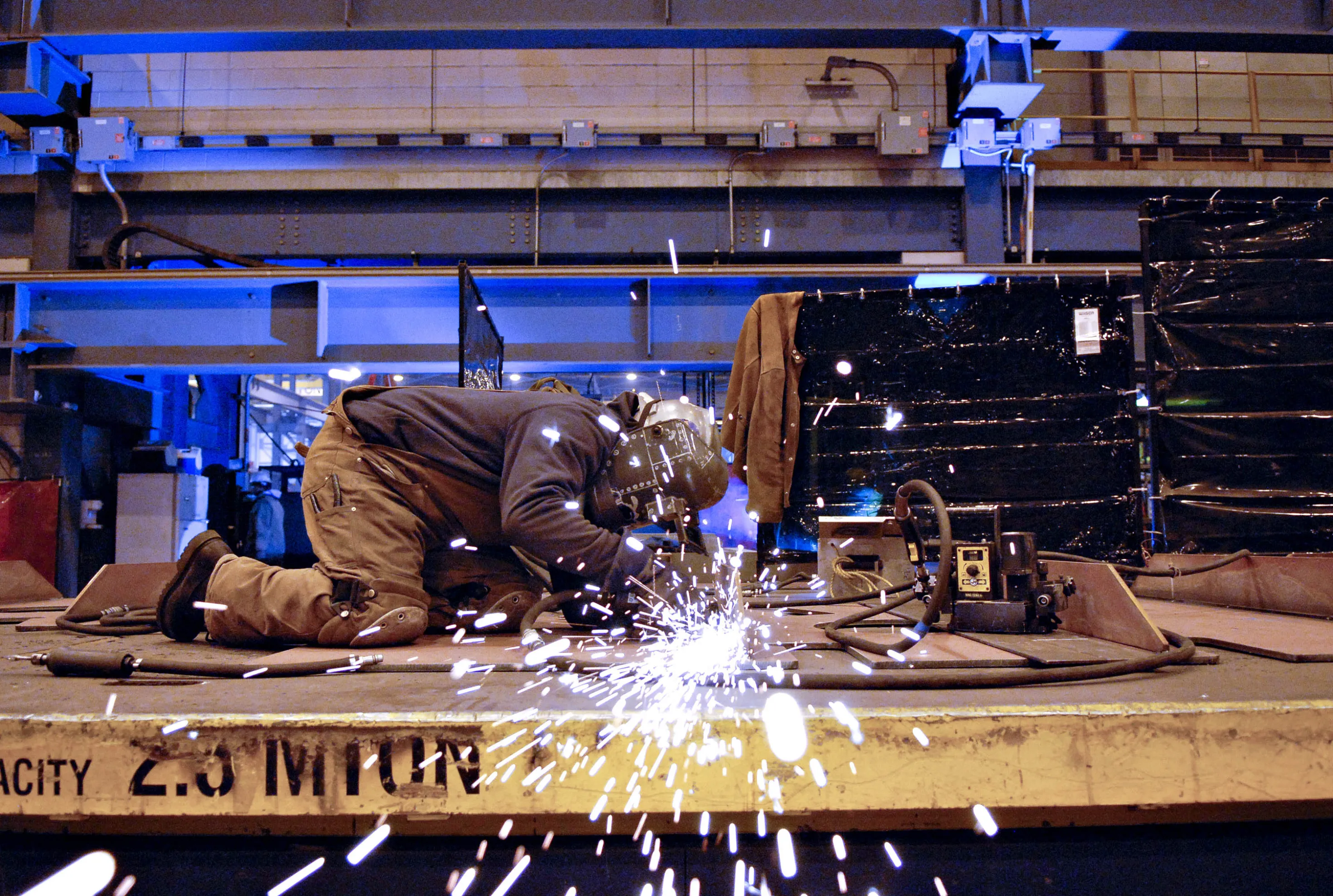 A welder works on assembling&nbsp;a tanker at a shipyard in Philadelphia, Pennsylvania.