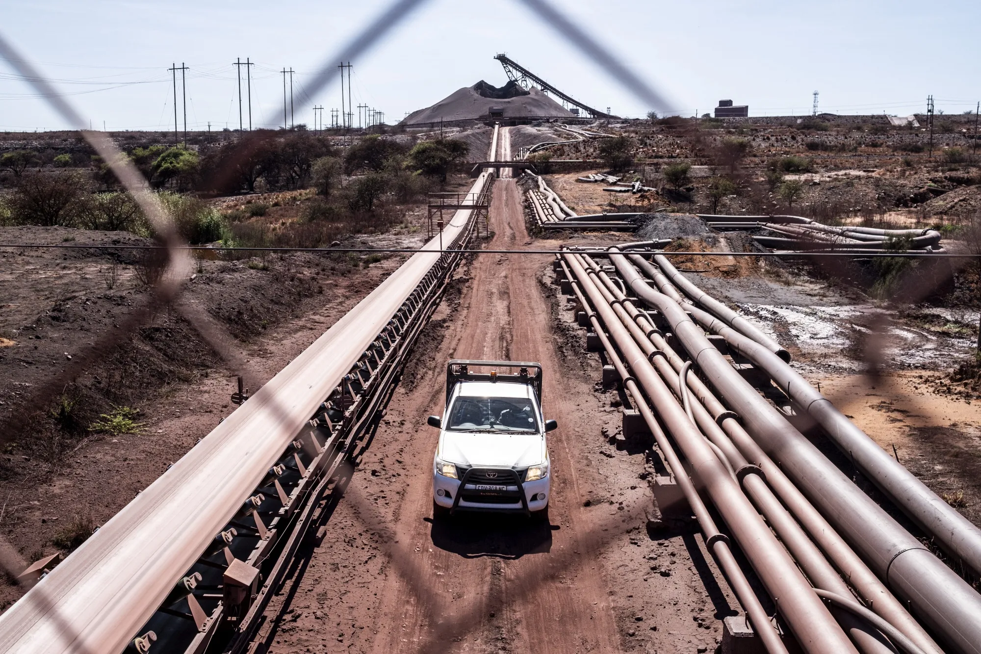 A vehicle drives at the Anglo American Sishen Iron Ore mine near Kathu, South Africa.