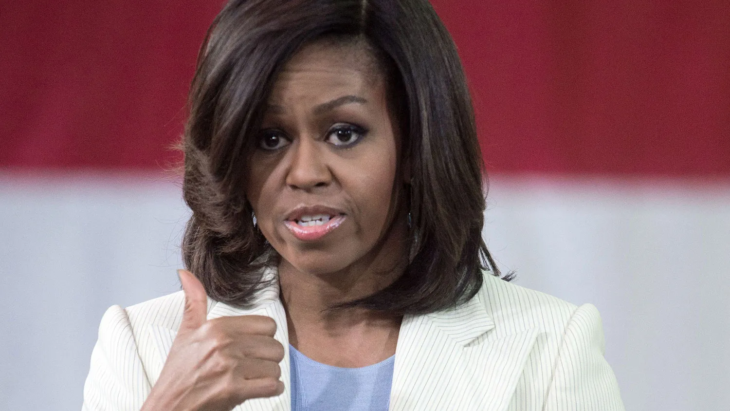 US First Lady Michelle Obama speaks about the Joining Forces initiative, calling on Americans to rally around service members, veterans, and their families, April 23, 2015 while visiting the Micron Technology factory in Manassas, Virginia.
