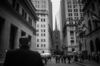 (EDITORS NOTE: Image has been converted to black and white.) Pedestrians walk near the New York Stock Exchange (NYSE) in New York, U.S., on Thursday, Feb. 25, 2016. Stocks retreated with government bonds, while the euro rallied to the highest level in almost a month as investors looked past an unprecedented boost from European monetary policy to focus on rising anxiety that policymakers have lost the ability to jumpstart global growth and stave off deflation.