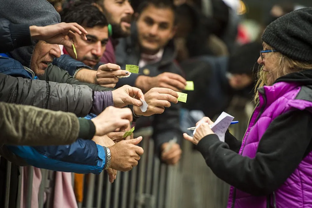 She’s handing out aid, not her phone number.