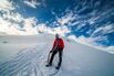 Climber descending Cotopaxi Volcano, Cotopaxi National Park, Cotopaxi Province, Ecuador, South America