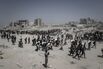 Palestinians carry aid supplies in northern Gaza in July.
