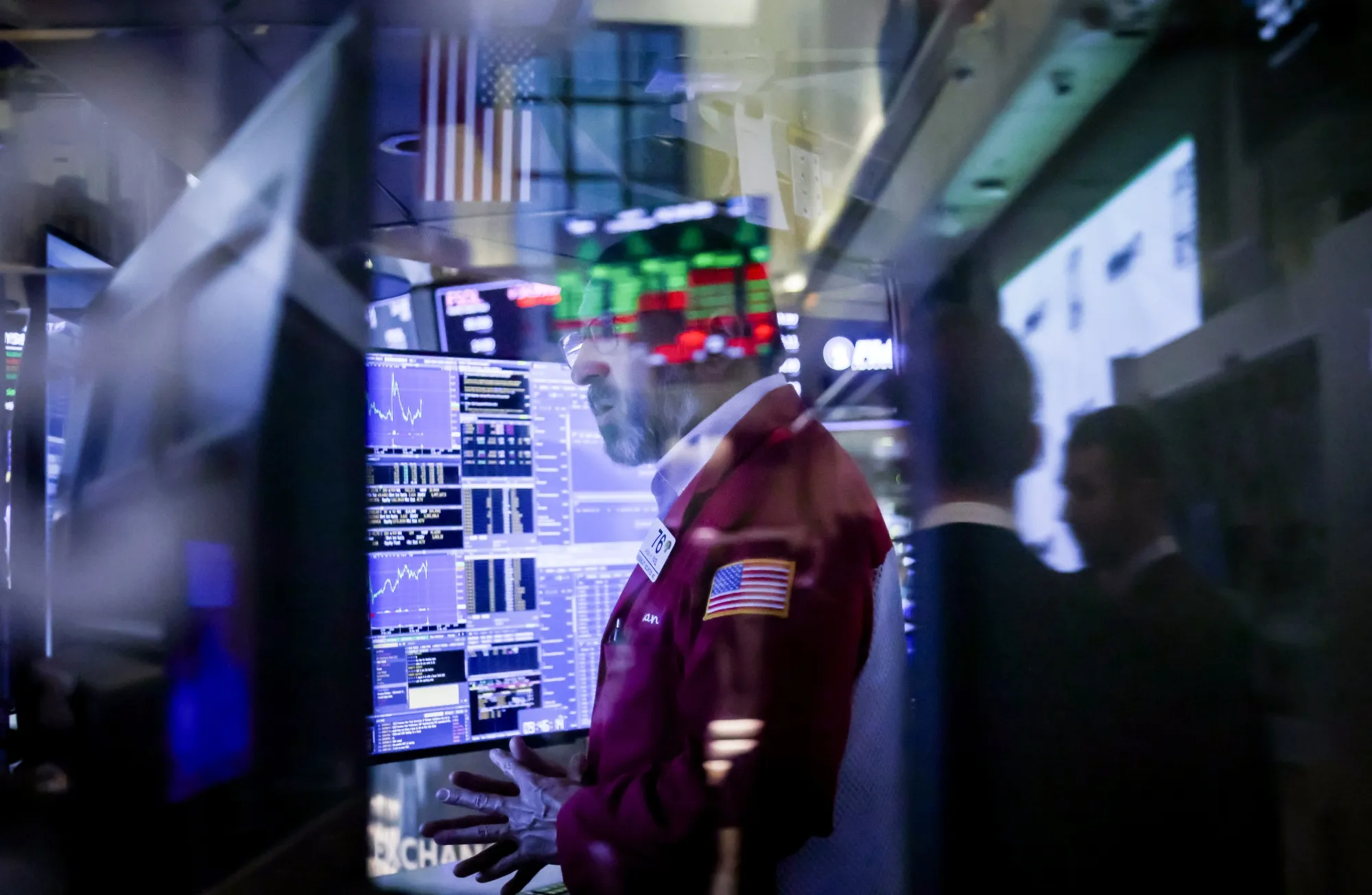 A trader works on the floor of the New York Stock Exchange, on Nov. 21.