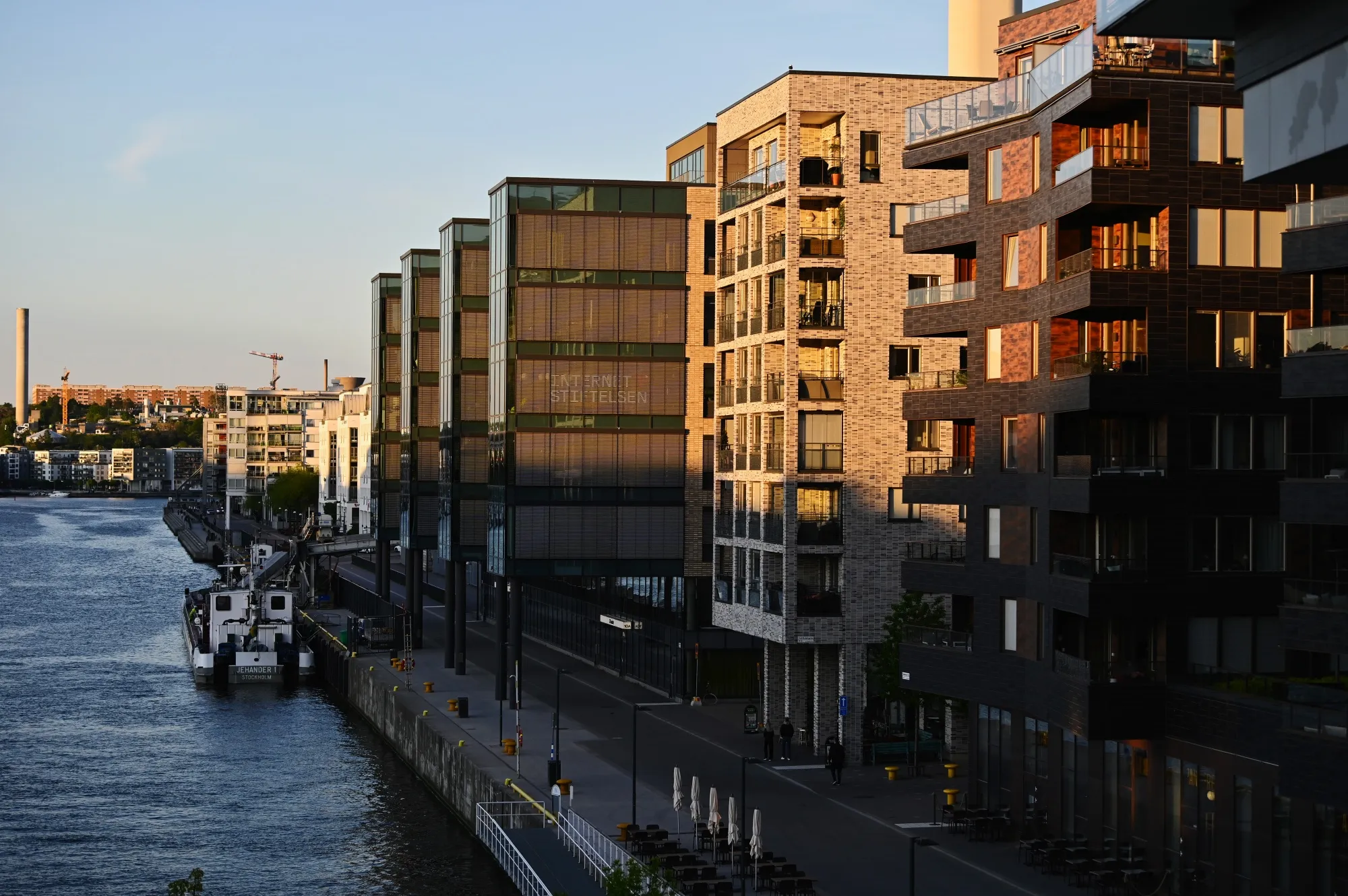 Evening sunlight illuminates residential buildings&nbsp;in Stockholm.