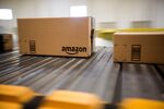 Boxes move along a conveyor at an Amazon fulfillment center on Cyber Monday.