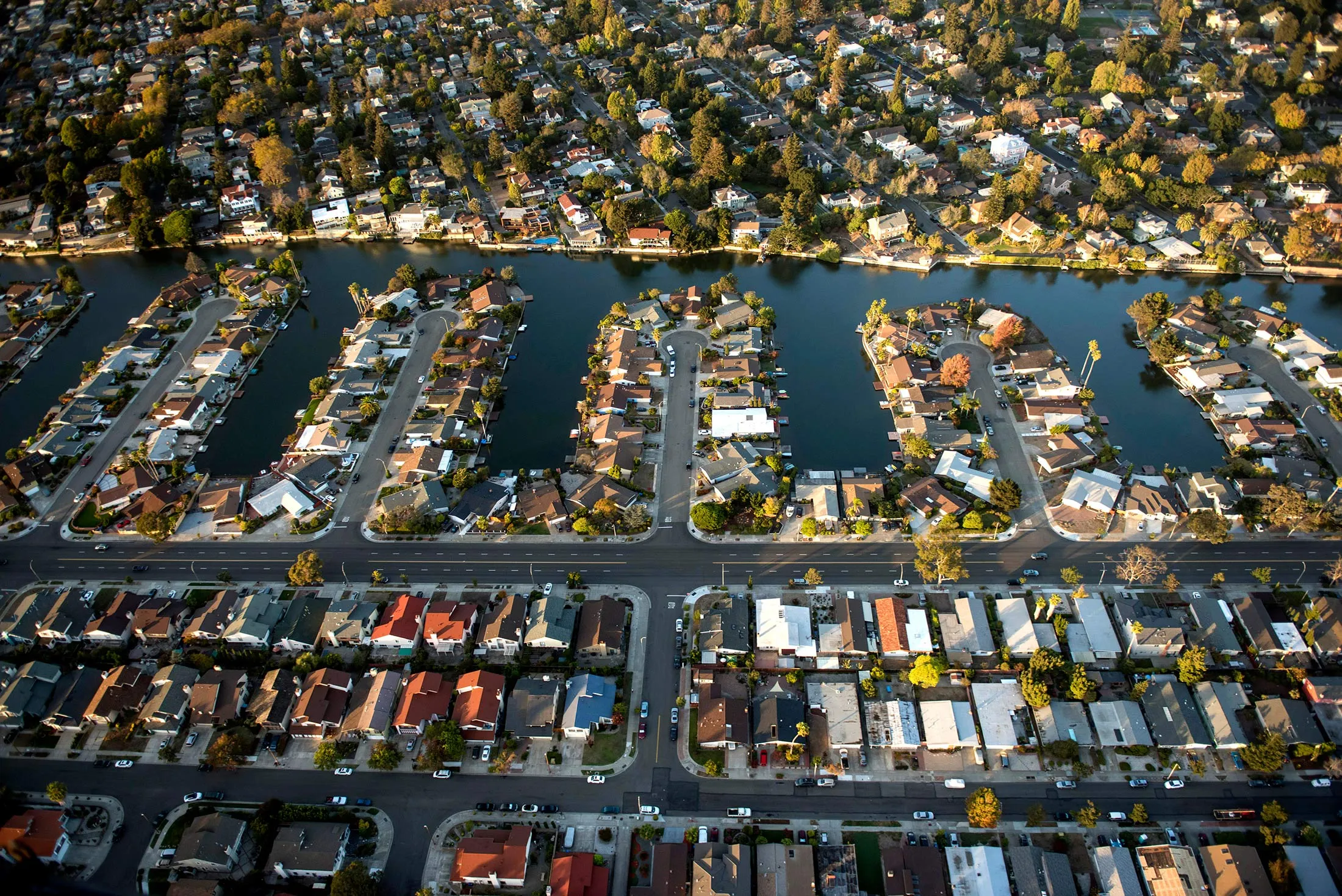 Houses stand in this aerial photograph taken above Alameda, California, U.S., on Monday, Oct. 5, 2015.