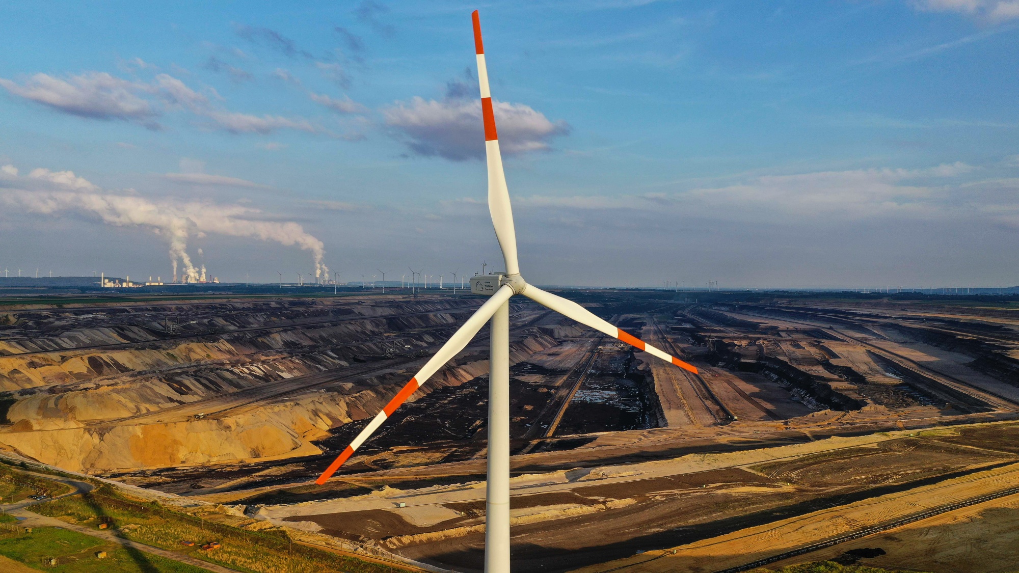 RWE AG Lignite Mine and Windfarm As Climate Scientists Call For Rapid End of Fossil Fuels 