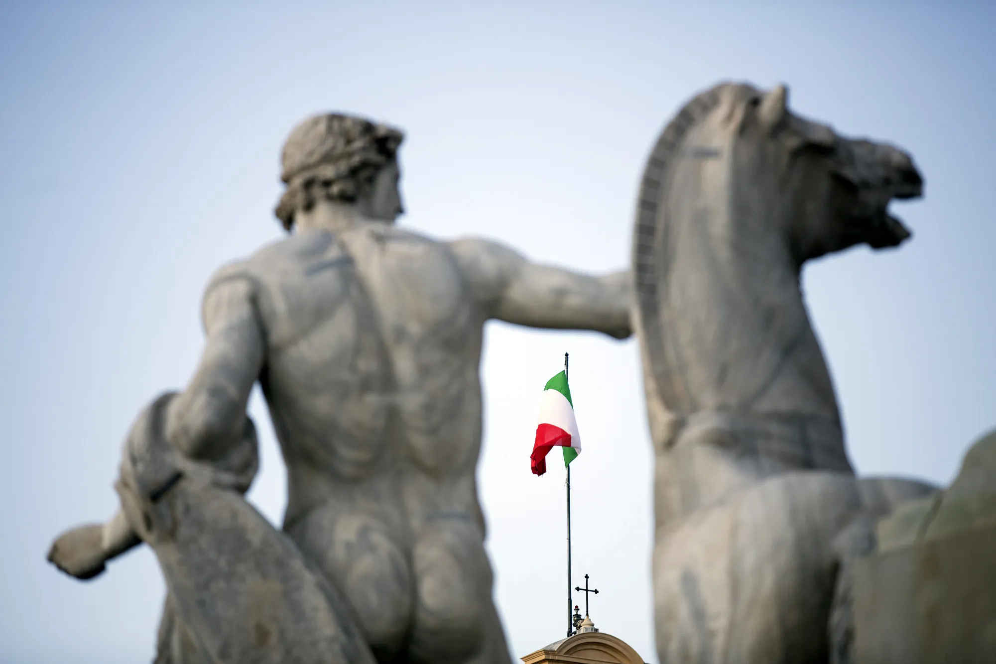 Italian flag flies atop the Quirinale palace in Rome