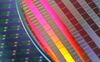 Silicon wafers made by Taiwan Semiconductor Manufacturing Co. (TSMC) are arranged for a photograph at the company's headquarters in Hsinchu, Taiwan, on Wednesday, Jan. 16, 2013. Taiwan Semiconductor Manufacturing Co., the world’s largest supplier of made-to-order chips, is scheduled to announce company results tomorrow.