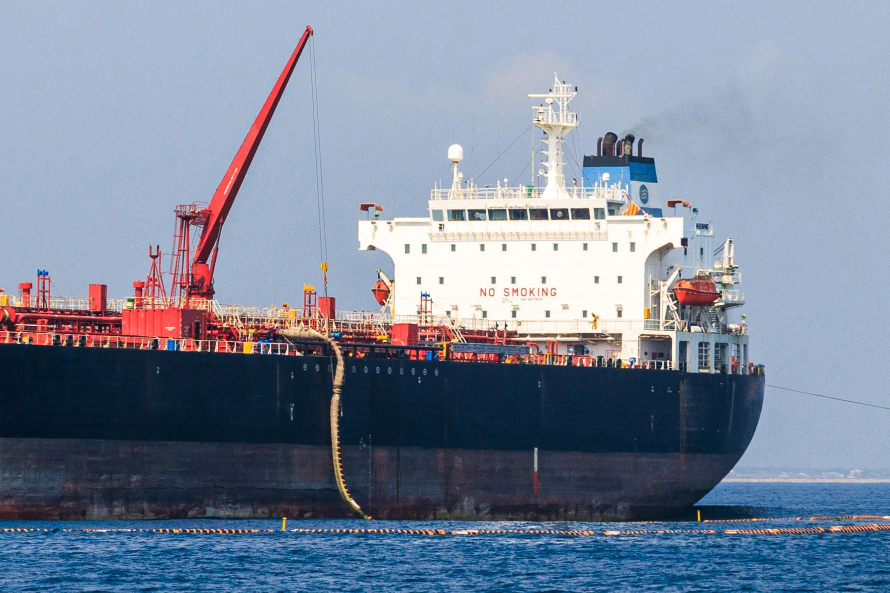 A tanker discharges crude oil in the first delivery&nbsp;to the Dangote Industries Ltd. refinery in the Ibeju Lekki district of Lagos.