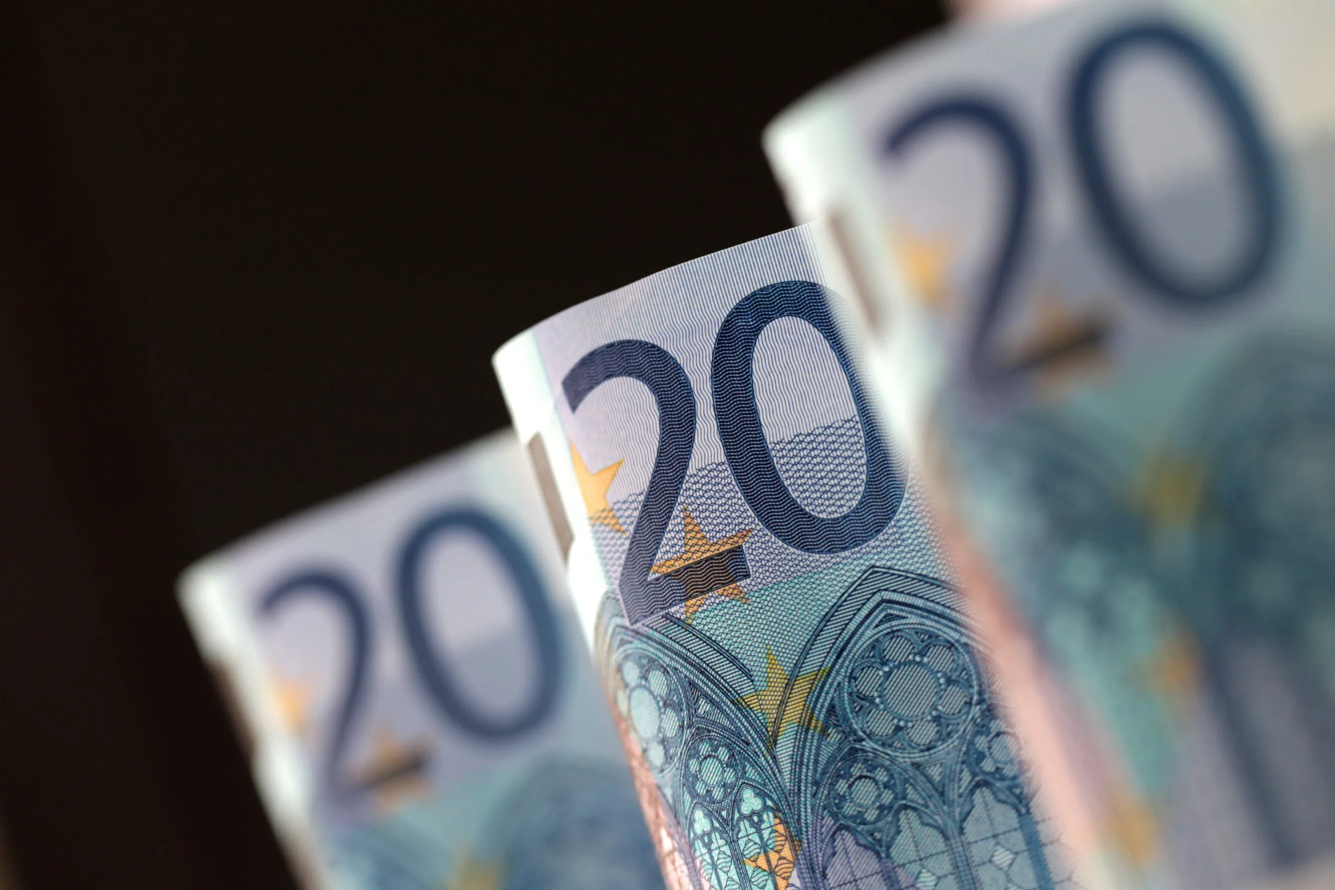 A set of 20 euro notes are arranged for a photograph in London, U.K., on Wednesday, Jan. 18, 2012. The euro strengthened and commodities rallied as an official at a Group of 20 nation said the International Monetary Fund is proposing a $1 trillion expansion of its lending resources. U.S. index futures rose before Goldman Sachs Group Inc. reports earnings.