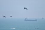 Chinese helicopters during a military exercise near Pingtan island, China’s closest point to Taiwan.