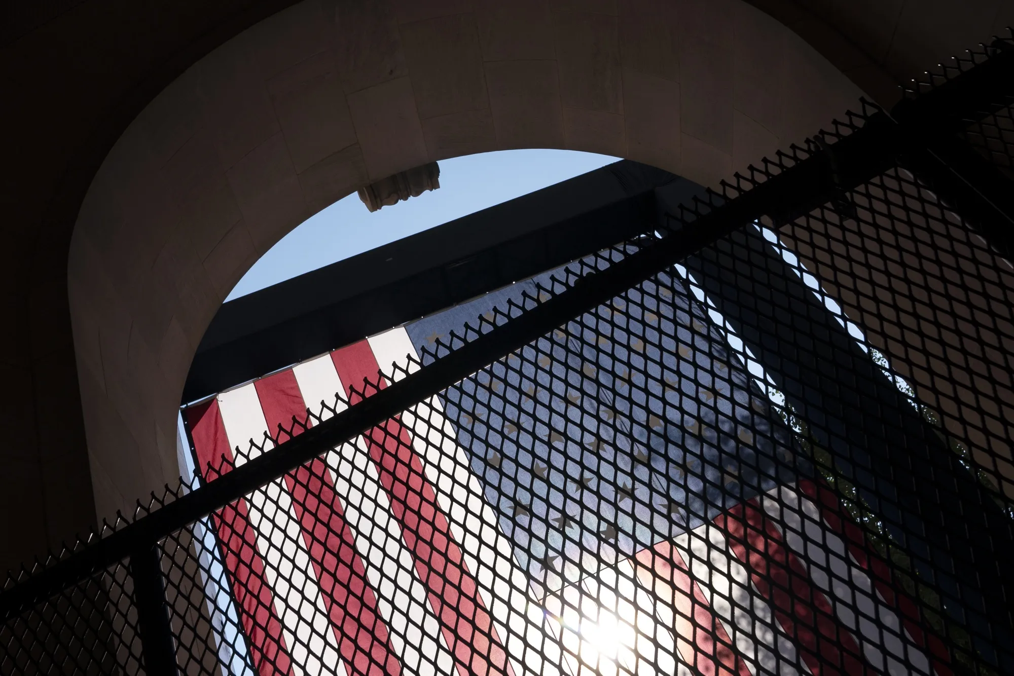An American flag hangs&nbsp;in Washington D.C.