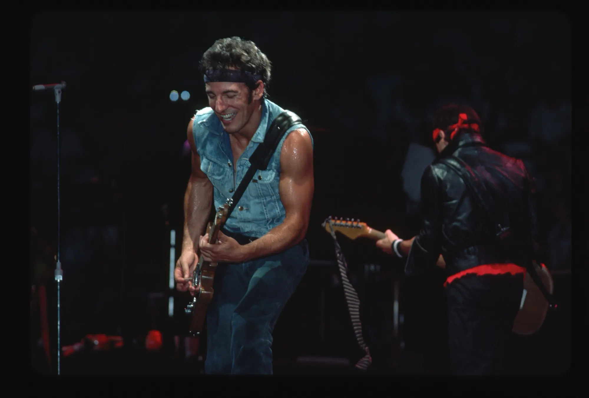 Bruce Springsteen on stage in 1984, two years after the release of Nebraska.