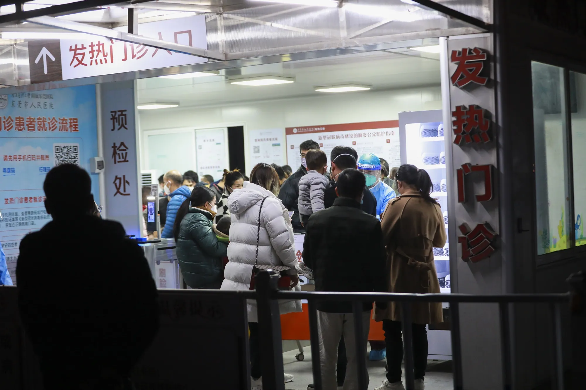Patients wait at a fever clinic of Dongguan People’s Hospital on Dec. 20.