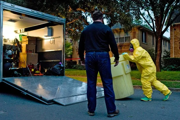 Health officials disinfect the Dallas apartment of a nurse infected with Ebola
