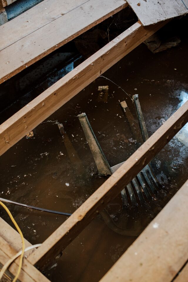 Mine runoff pooled under the floorboards at the home Hatfield had to abandon.