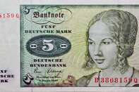 A five Deutsche Mark bill, the former currency of Germany, i