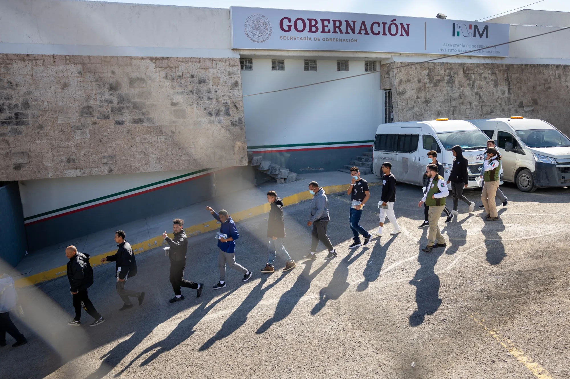 Venezuelan migrants&nbsp;are escorted by Mexican immigration agents after being expelled from the United States on January 09 in Ciudad Juarez, Mexico.