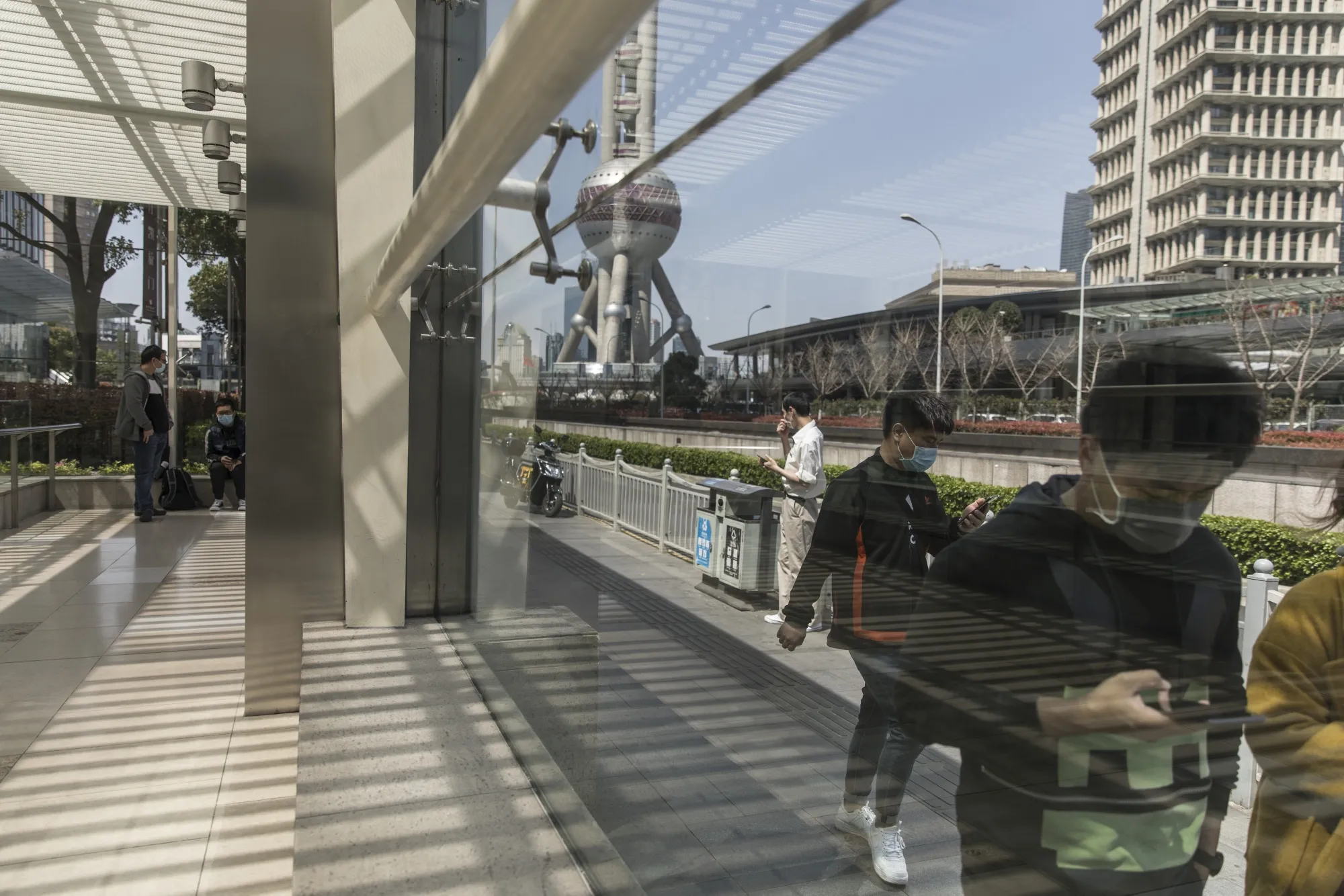 Office Workers in Shanghai as Premier Says Most of China Is Returning to Normal