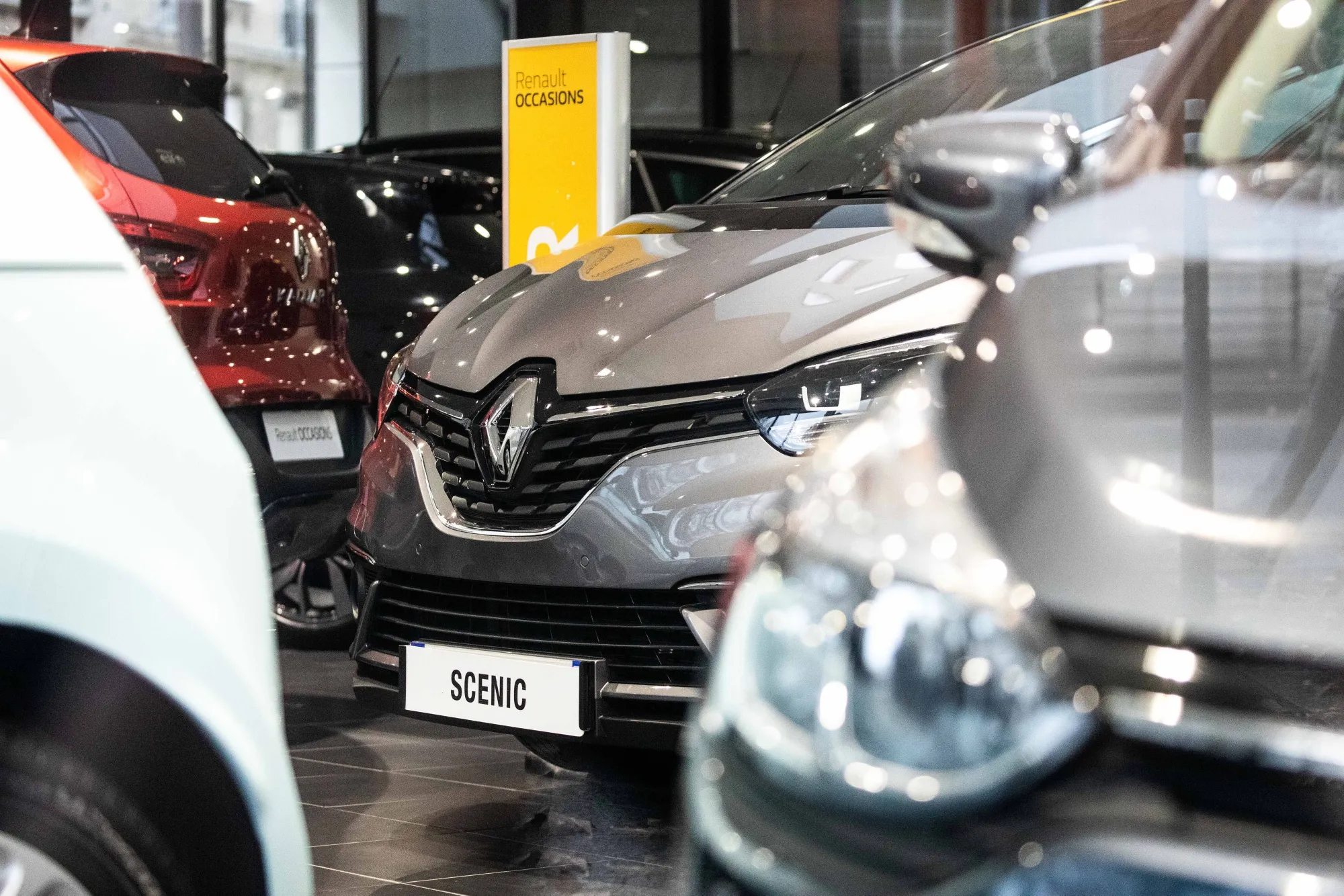 A Renault Scenic automobile stands on display inside a Renault SA showroom in Paris, France, on Tuesday, Nov. 20, 2018.&nbsp;