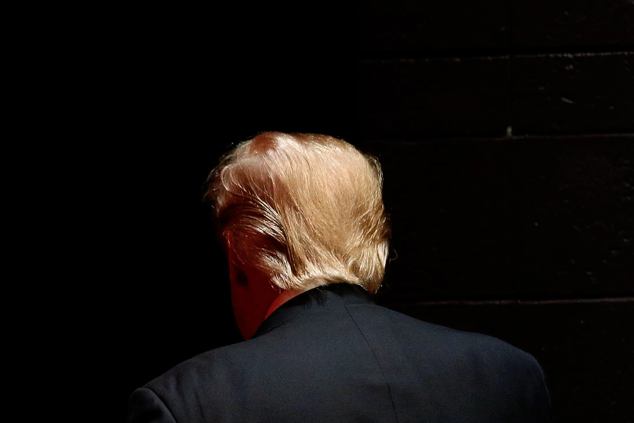 Republican presidential candidate Donald Trump walks offstage after speaking at a campaign event at St. Norbert College in De Pere, Wis., on&nbsp;March 30, 2016.
