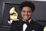 Trevor Noah appears at the 63rd annual Grammy Awards in Los Angeles on March 14, 2021. Noah will host the 64th annual Grammy Awards on April 3. (Photo by Jordan Strauss/Invision/AP, File)