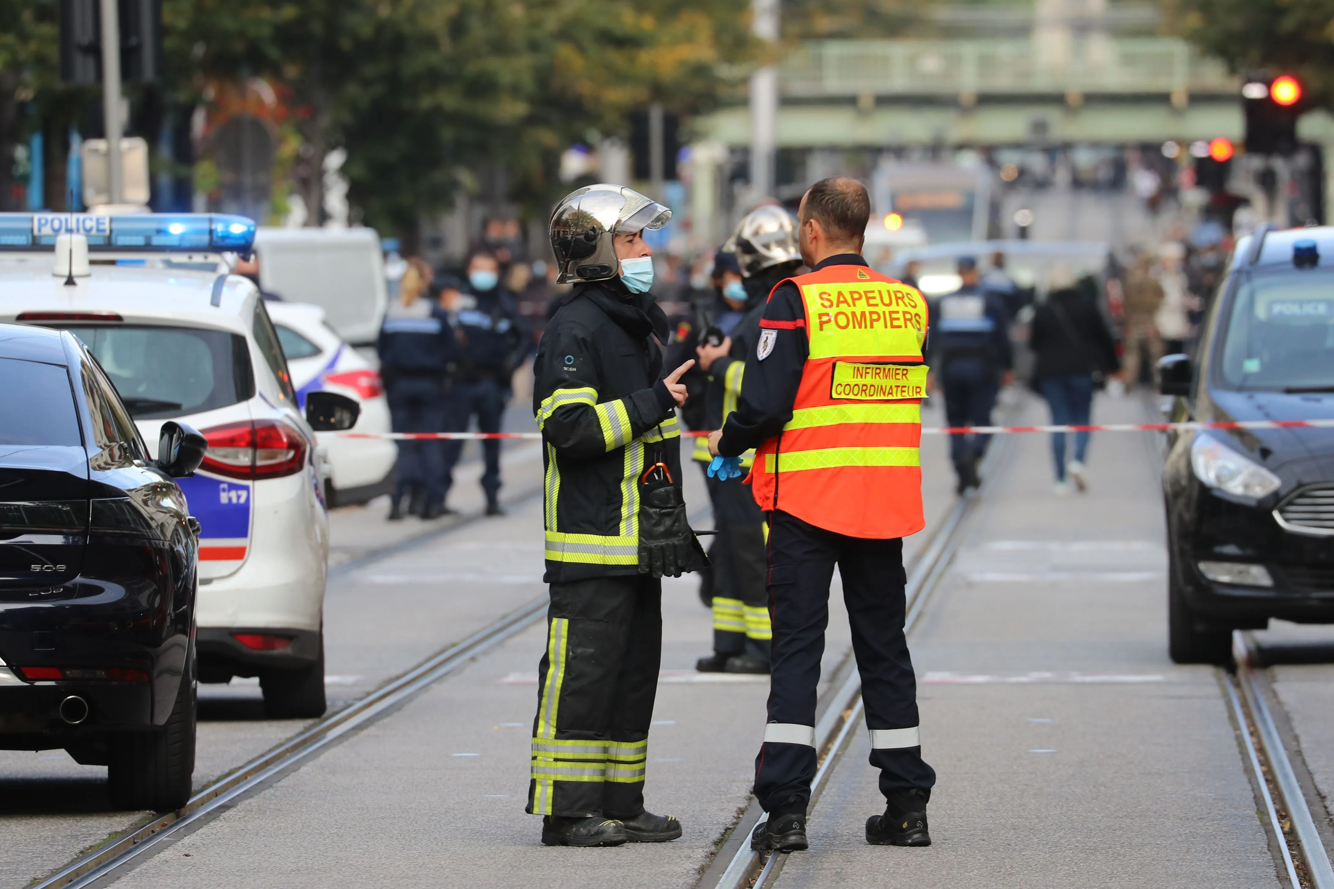 Emergency services attend the site of the attack in Nice, France, on Thursday.