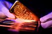 Gold Rises to Record as Weaker Dollar Extends Scorching Rally