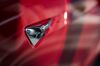 The Tesla Inc. logo is seen on the side-view camera of a Tesla Inc. Model S P100D sedan vehicle at the company's new showroom in New York, U.S.