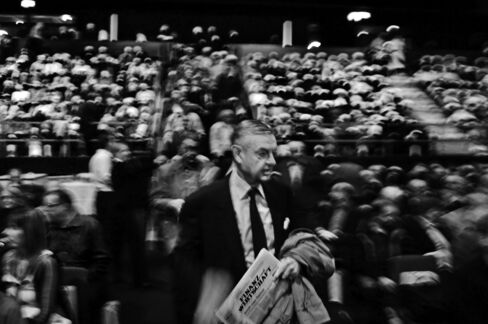 Shareholders attend the annual general meeting of UBS, in a concert hall in Basel.