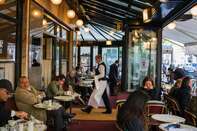 France Reopens Cafe Terraces as Europe Reawakens From Pandemic 