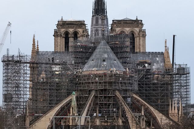 Scaffolding covers the exterior of Notre-Dame