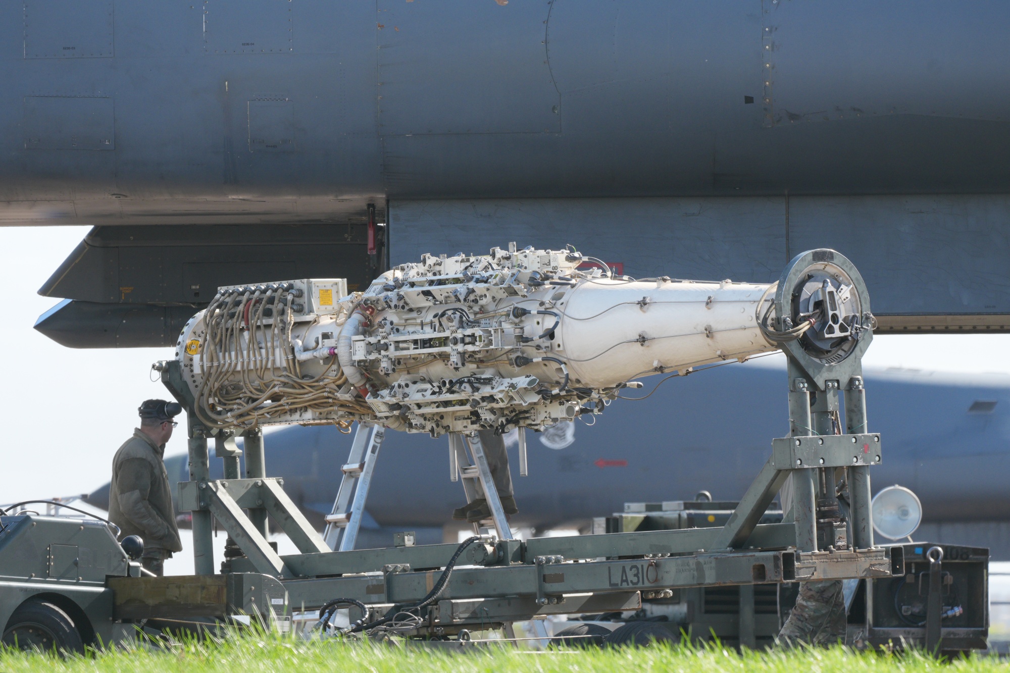 Ground Crew remove a rotary launch system from the bomb bay of a US Air Force B-1 bomber at RAF Fairford on March 11 in Fairford, England.