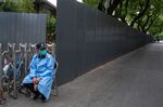 Barriers surrounding a neighborhood placed under lockdown due to Covid-19 in Beijing, on May 31.