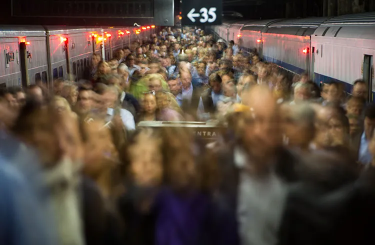 Commuters exit a Metro-North Railroad train at Grand Central Terminal in New York, U.S.
