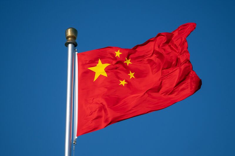 A Chinese flag flies at Tiananmen Square in Beijing