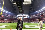 ARLINGTON, TEXAS - DECEMBER 06: Big 12 Commissioner Brett Yormark walks across the field during the first half the Big 12 Championship game between the Texas Tech Red Raiders and the BYU Cougars at AT&T Stadium on December 06, 2025 in Arlington, Texas. (Photo by John E. Moore III/Getty Images)