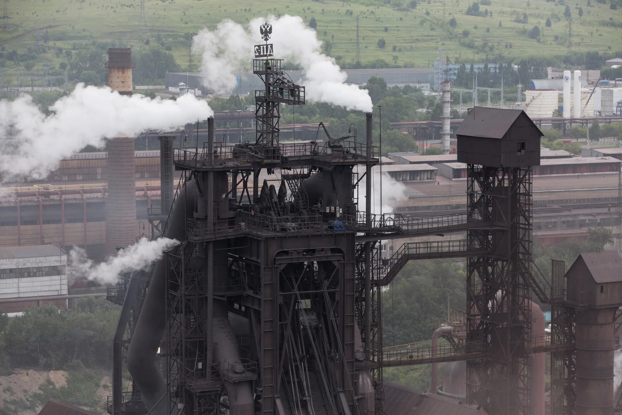 Vapor rises from the site of the blast furnace at the Evraz Plc Consolidated West-Siberian Metallurgical Plant in Novokuznetsk, Russia.
